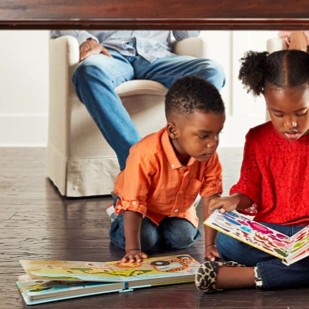 Kids with book | Carpetland USA Granite & Flooring